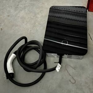 Black and White Electric Vehicle Charger